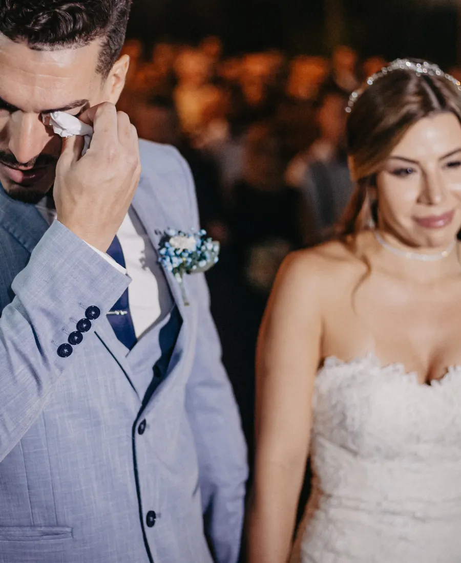 Couple sharing an emotional moment during their wedding ceremony